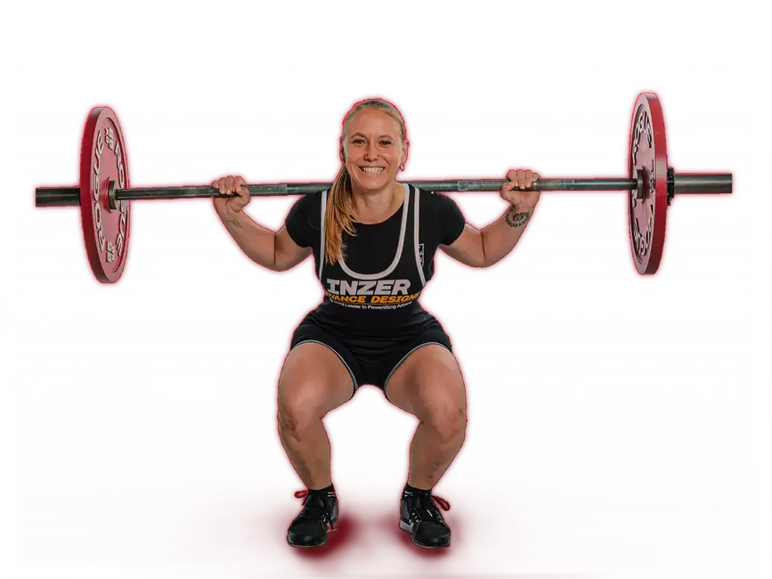 Ein Gewichtheber vom Verein Turngemeinde Landshut geht in die Kniebeuge mit einer Langhantel auf den Schultern.