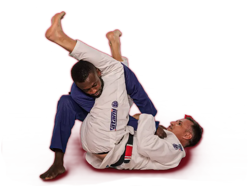 Zwei Männer in BJJ-Kleidung üben Bodentechniken, während sie bei der Turngemeinde Landshut im Sportverein trainieren.